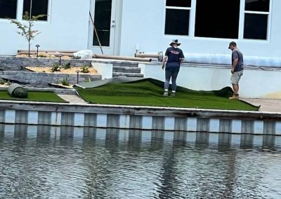 Treasure And Dan Actively Installing Turf